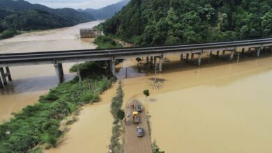 Floods and landslides in southern China claimed at least 13 lives