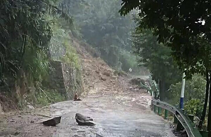 A mountain slide caused by rain killed 11 people in southeast China