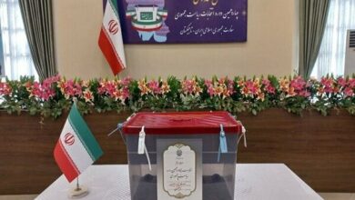 Iranian people at the polls for the second round of presidential elections