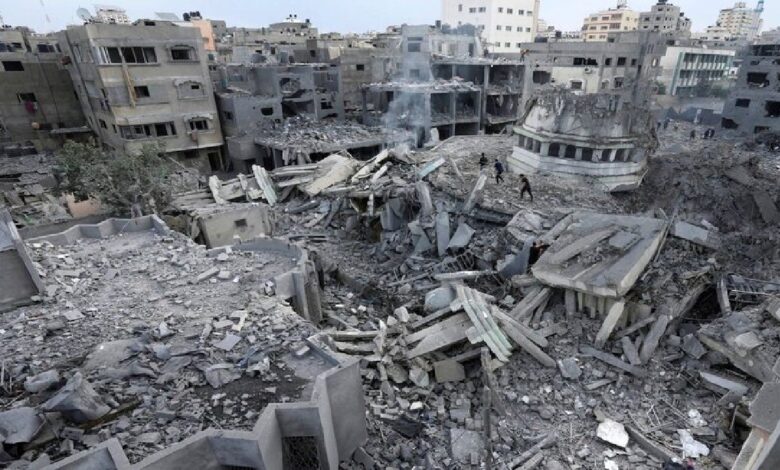 Removing the burnt bodies of 60 martyrs from under the rubble in western Gaza