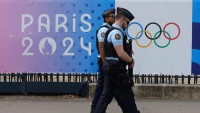 The French runner was banned from the opening ceremony of the Olympics due to wearing a hijab