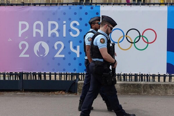 The French runner was banned from the opening ceremony of the Olympics due to wearing a hijab