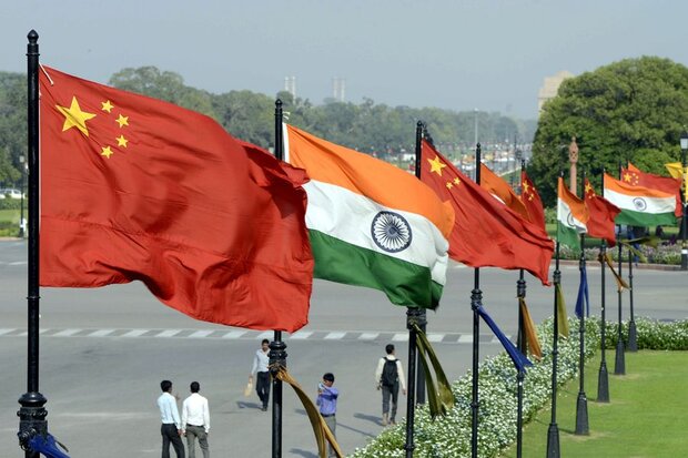 The International Monetary Fund raised the economic outlook for India and China