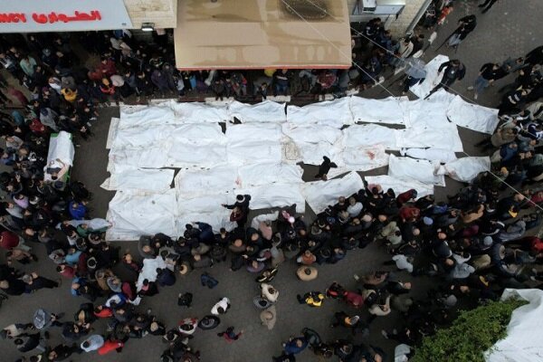 Palestinian refugees fell to the ground during morning prayers