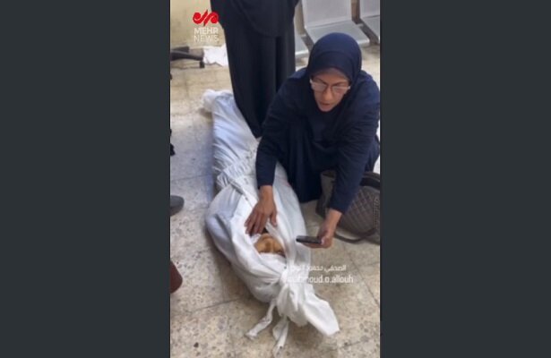 Recitation of the Holy Quran by a grieving Palestinian mother over the body of her martyred son