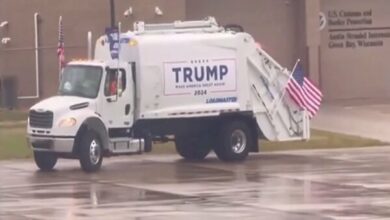 “Trump” riding a garbage truck + video