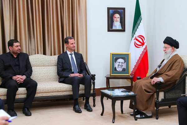 What was the story of Imam Khamenei's warning to Bashar al-Assad?