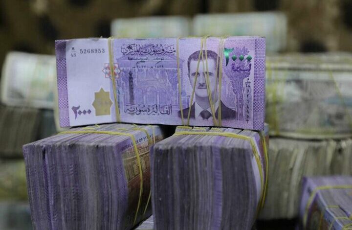 The value of the Syrian currency was halved