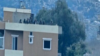 Israeli soldiers shooting at people from the roofs of Mis al-Jabal houses in southern Lebanon