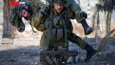 Zionist military wounding near the Lebanese border
